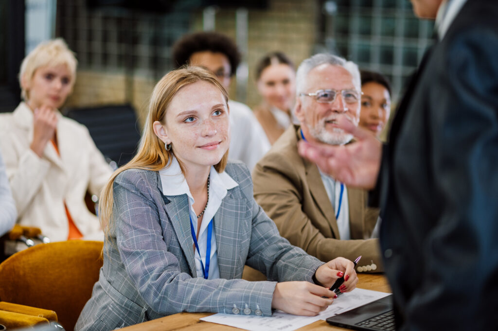 Cinematic image of a conference meeting. Student on Fire Safety Training